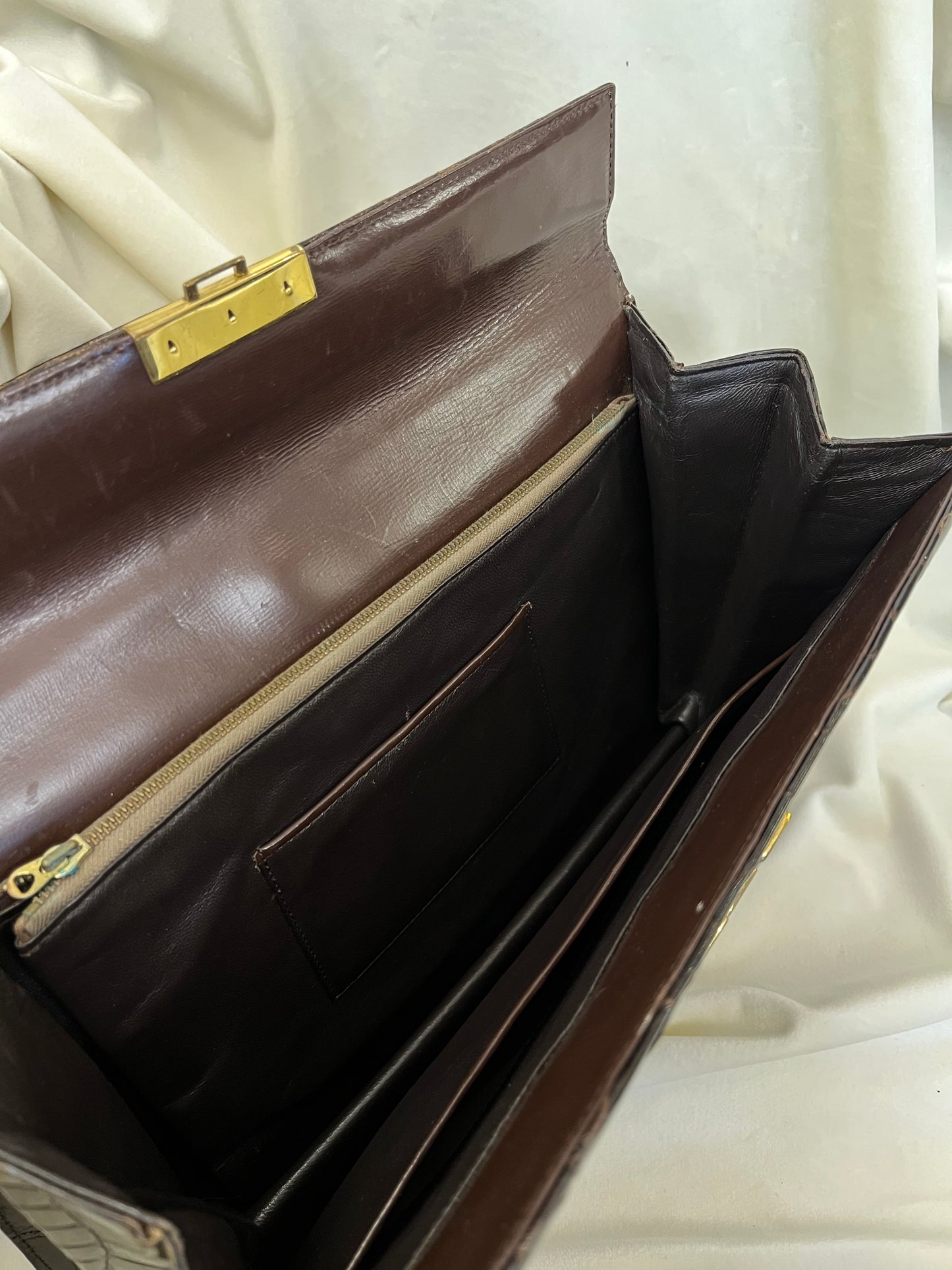 Tamsiai rudos spalvos odinė rankinė